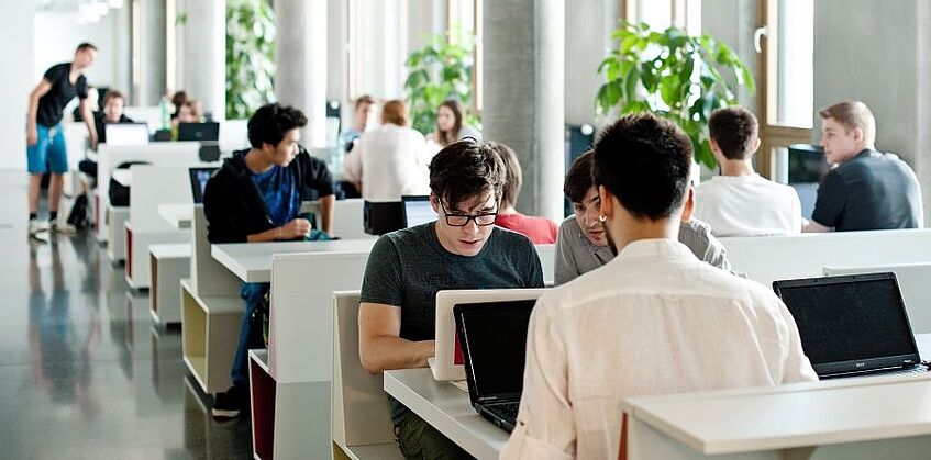 Students sitting and learning in the Student Space.