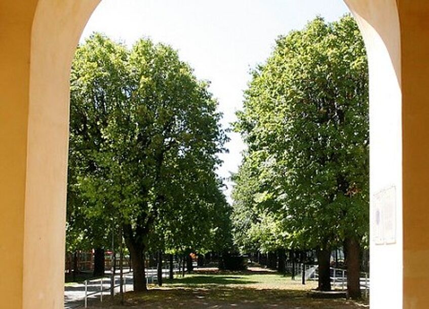 Passage to courtyard 1 from courtyard 2 on campus.