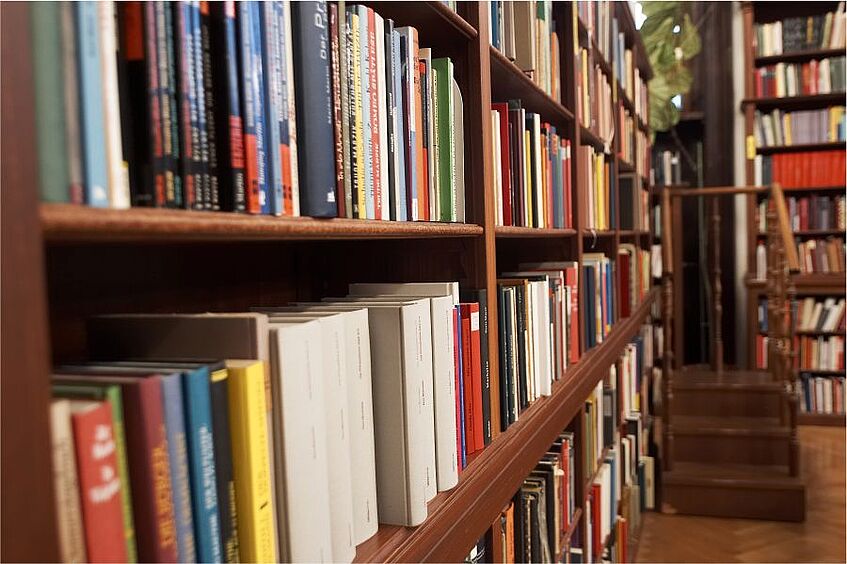 Row of bookshelves in a library.