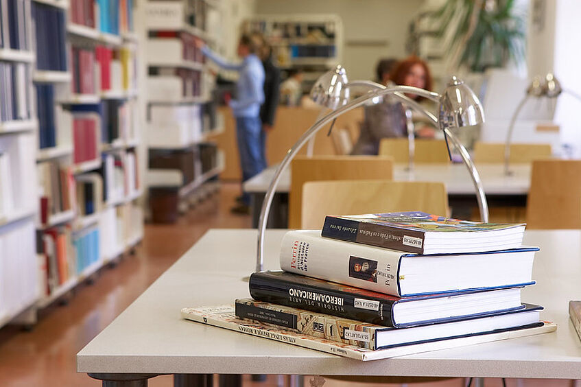 Stacked books in a library.