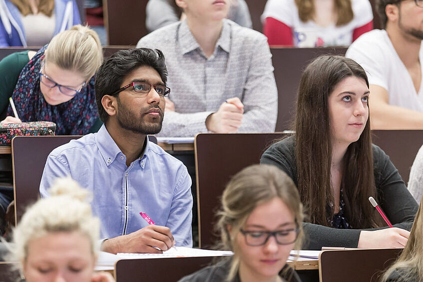 Students sitting in the lecture hall.