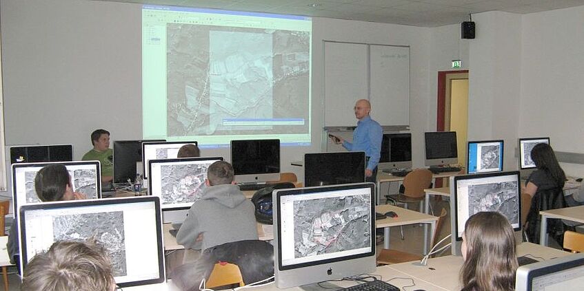 Students in a computer room during a lecture.